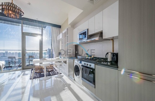 Motor City Apartment | Pleasing Studio Apartment in Miraclz Tower, Arjan-Dubailand by Deluxe Holiday Homes