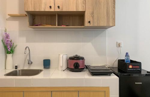 Bekasi Timur Apartment | Pleasurable 2BR Transpark Juanda Apartment By Travelio