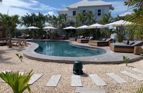 San Pedro Villa | Plumeria House at Mahogany Bay and Pool Club