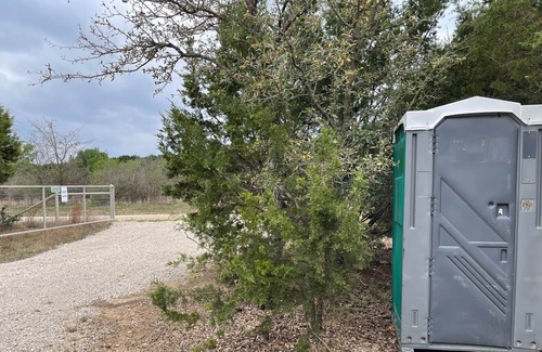 Graham RV Rental | Pondside Primitive Cabin at Lake Godstone