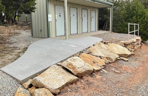 Graham RV Rental | Pondside Primitive Cabin at Lake Godstone