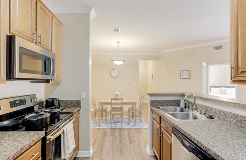 The Colony Apartment | Pool & Hot Tub! Minutes from Andretti's and COSM - Near The Star & Legacy West!
