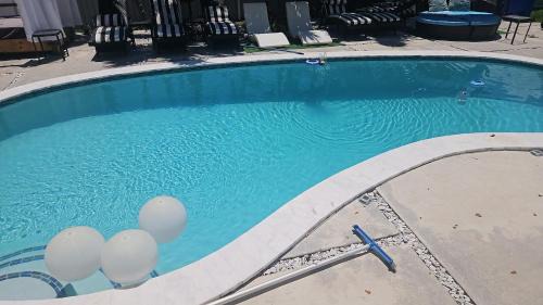 Hollywood Lakes Villa | Pool Paradise Half mile to Beach w Massive Yard!