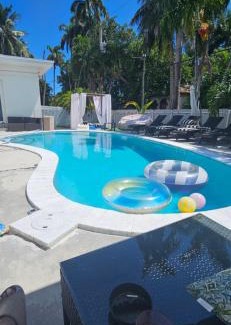 Hollywood Lakes Villa | Pool Paradise Half mile to Beach w Massive Yard!