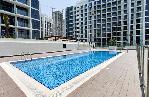Nad Al Sheba Apartment | Pool View & 2 adults 2 kids & Brand New & Czechin