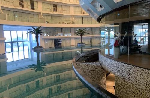 Dumas Apartment | Pool View Apartments Managed By Rhoof Hospitality Near Dumas Beach