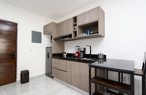 Villa Marina Apartment | Pool View Studio, Home Office Space, Amenities everywhere, Secure, Near beach