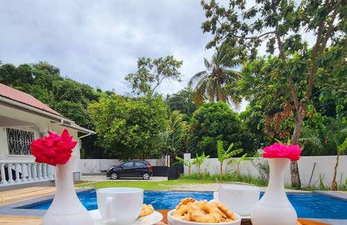Beau Vallon Villa | Pool villa in Beau Vallon with bamboo dining shelter