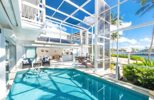 Rum Point Apartment | Pools of the Kai 6 - Beachfront Condo with Private Pool Atrium, Modern Kitchen, and Outdoor Grill