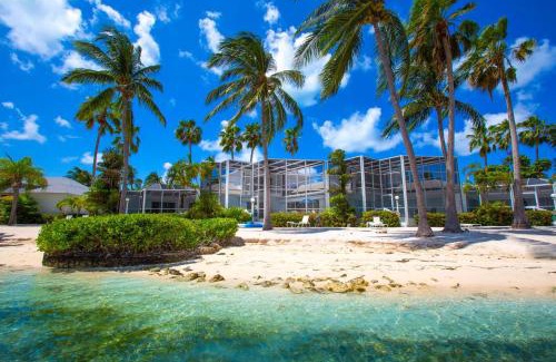 Rum Point Apartment | Pools of the Kai 6 - Beachfront Condo with Private Pool Atrium, Modern Kitchen, and Outdoor Grill
