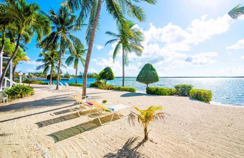 Rum Point Apartment | Pools of the Kai 3 - Waterfront Condo with Private Pool Atrium, Walk to Restaurants