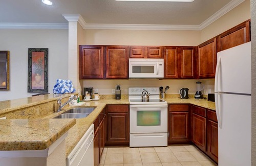 Four Corners Apartment | Poolside condo at Tuscana Resort with Hot Tub. Close to Disney!