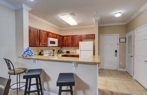 Four Corners Apartment | Poolside condo at Tuscana Resort with Hot Tub. Close to Disney!