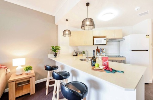 Darwin City Centre Apartment | Poolside Resort Living on Esplanade with Balcony