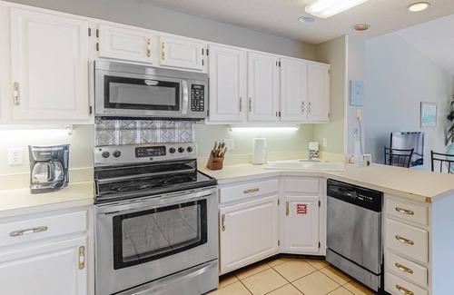 East End House | Poolside townhouse with deck, beach gear, washer/dryer, on-site pool, grill