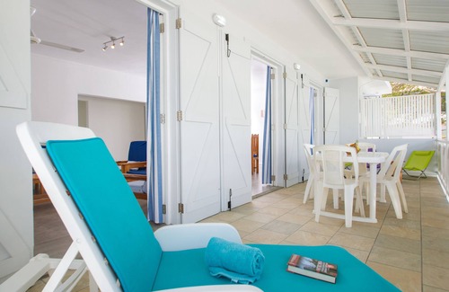 Trou aux Biches House | Porcelaine: Stylish apartment with seaview from its balcony