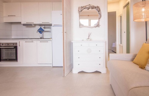 Portisco Apartment | Portisco Bouganville Seaside Charm Flat W/Veranda
