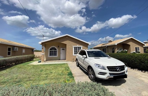 Caribbean Estates House | Portmore Haven: Secure Retreat with Beach Access