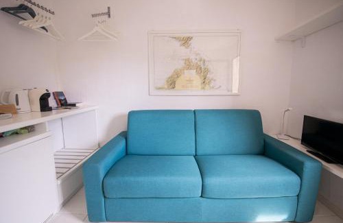 Porto Rotondo Apartment | Porto Rotondo Stay - La stanza nel centro storico del Paese