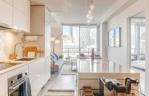 Bridgeland Condo | Postcard Views w/Chic Decor, Office, Parking