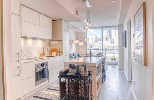 Bridgeland Condo | Postcard Views w/Chic Decor, Office, Parking