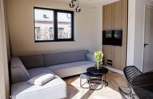 Baarland House | Prachtige bungalow op vakantiepark bij zee.