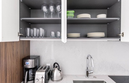 Seaport District Apartment | Practical Seaport 1BR w/Gym, Pool, W/D, Doorman