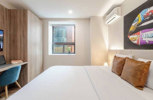 Gay Village House | Prada king– Heart of MTL Stay