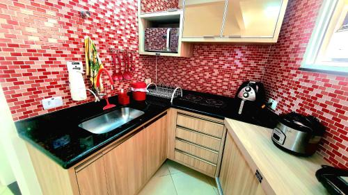 Tombo Apartment | Praia do Tombo - Guarujá - Pé na areia
