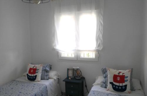Poblado de Sancti Petri Apartment | Precioso apartamento en primera línea de playa de la Barrosa