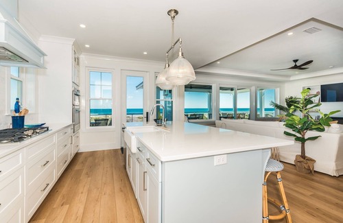 Butler Beach House | Premier Oceanfront Luxury Vacation Rental With Mediterranean Pool and Hot Tub