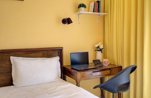 Chicalim Apartment | Premium 2BHK -10 min to GOI airport & beach -Pool access -Balcony with city view