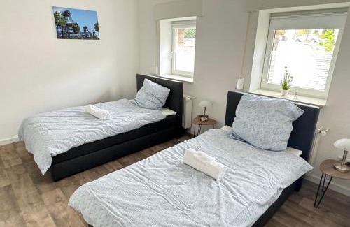 Hamm Apartment | Premium 4 Bett Appartment ,WIFI, Waipu TV, Waschmaschine, Trockner, Küche in Hamm