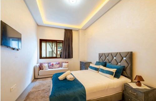 Ain Harrouda Apartment | Premium Romantic 1 Bedroom & Living Room with Swimming pool & Garden view