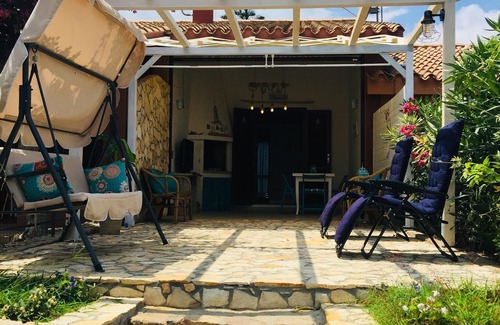 Costa Rei House | Pretty cottage with sea view within walking distance of the beach.