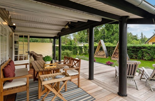 Farvang House | Pretty log house in idyllic location.