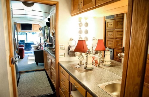 Port Angeles Cabin | Prevost Tour Bus at Whiskey Creek Beach NW