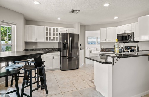 North Palm Beach Heights House | Prime Jupiter Location , 4 bedroom, 2.5 bath, Outdoor Kitchen, Pool