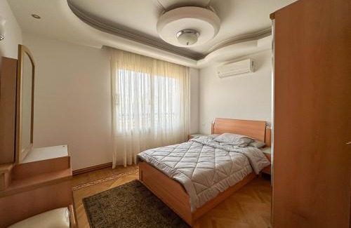 Zawiyya Al-Hamra Apartment | Prime Location 3BR Apartment Close to Airport
