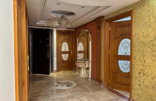 Zawiyya Al-Hamra Apartment | Prime Location 3BR Apartment Close to Airport