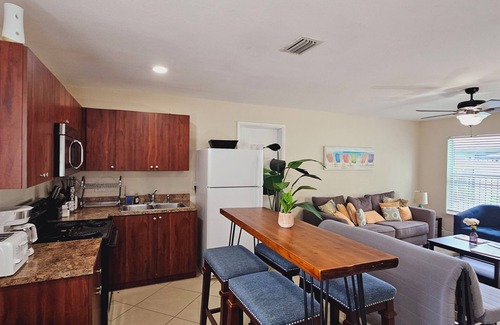 Central Business District Villa | Prime Location, Beachy House with Private Patios & Pool. Close to the beaches!