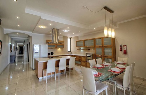 Gzira Apartment | Prime location with breathtaking sea views! Stay in style at this modern, fully furnished 4-bedroom apartment in the heart of Sliema, Malta.
