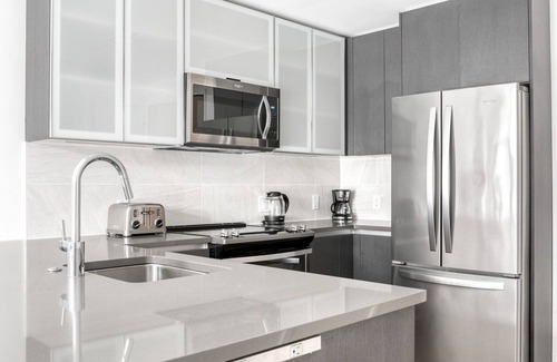 Shawmut Apartment | Prime NewCo South End 1BR near Ink Block w. W/D and Gym by Blueground