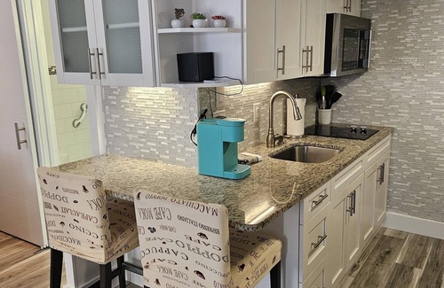 Southwest Orlando Condo | Prime Resort Studio near Universal & Disney balcony with LAKE VIEW
