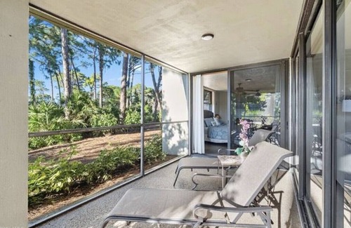 Bonita Bay Apartment | Pristine Corner Unit - Golf Course Views from Quiet Wrap Around Lanai
