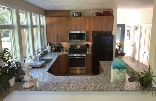 East Falmouth House | Private beach and wooded retreat on Coonamessett Pond