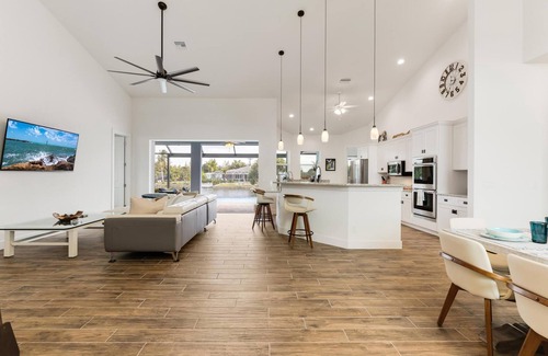 Burnt Store House | Private Beach with volleyball, Saltwater pool & spa - Villa Siren Calling - Roelens Vacations