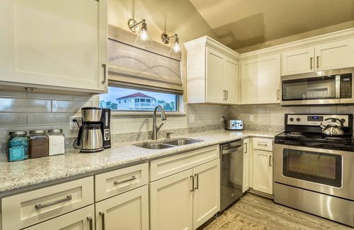 Alligator Point House | Private Beachfront that Includes a Golf Cart, Kayaks, Paddle Boards & Bikes