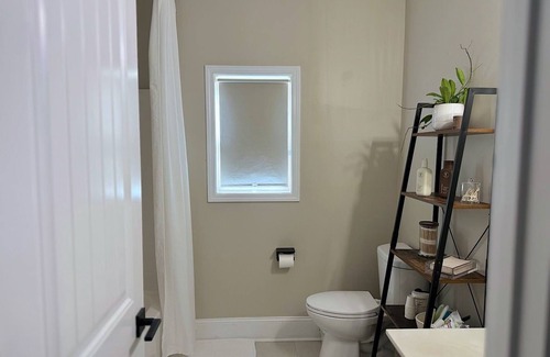 Grayson House | Private bed and bathroom with partition and own entrance.