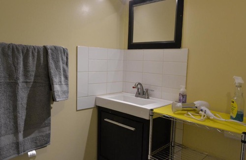 Forest Lawn House | Private Bedroom in Basement with Shared Bathroom - Fonda